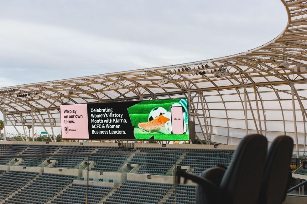 An ad for Women\u2019s History Month from ACFC and Klarna at the Banc of California Stadium.