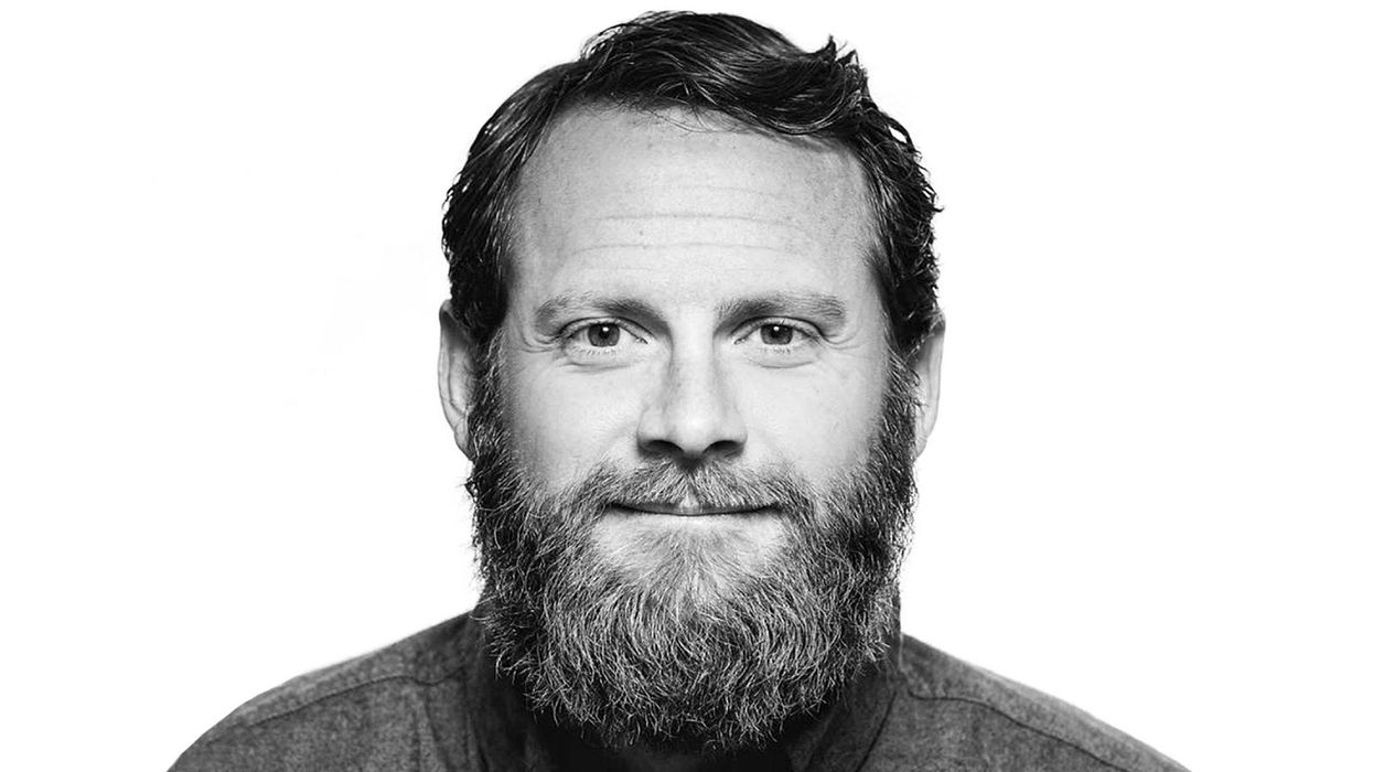 Black and White headshot of HydroFlask Founder Travis Rosbach