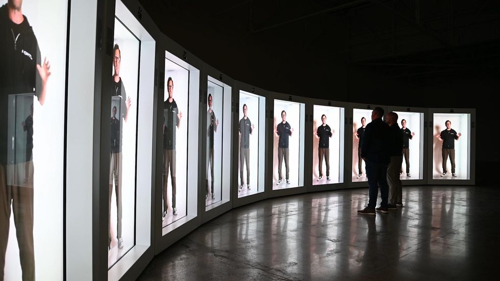 CEO David Nussbaum beaming into 12 Proto booths at once at the company\u2019s factory in Michigan.