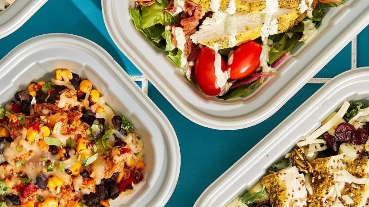 Different salads in plastic containers