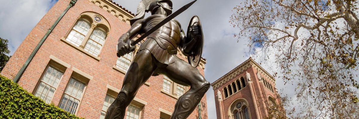 Exterior view of the beautiful Tommy Trojan and Bovard Aministration buiding in USC on MAR 16, 2018 at Los Angeles, California