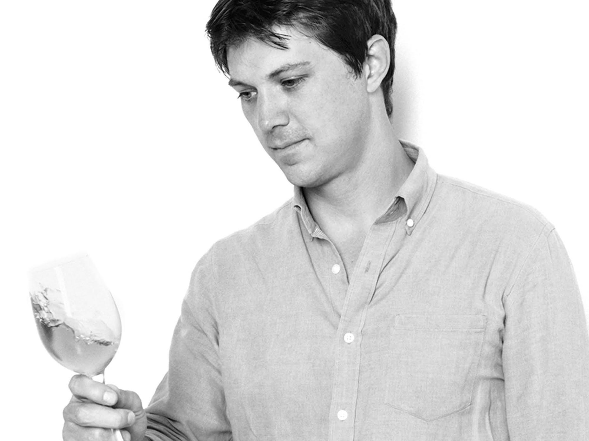 Jason Wise holding wine glass