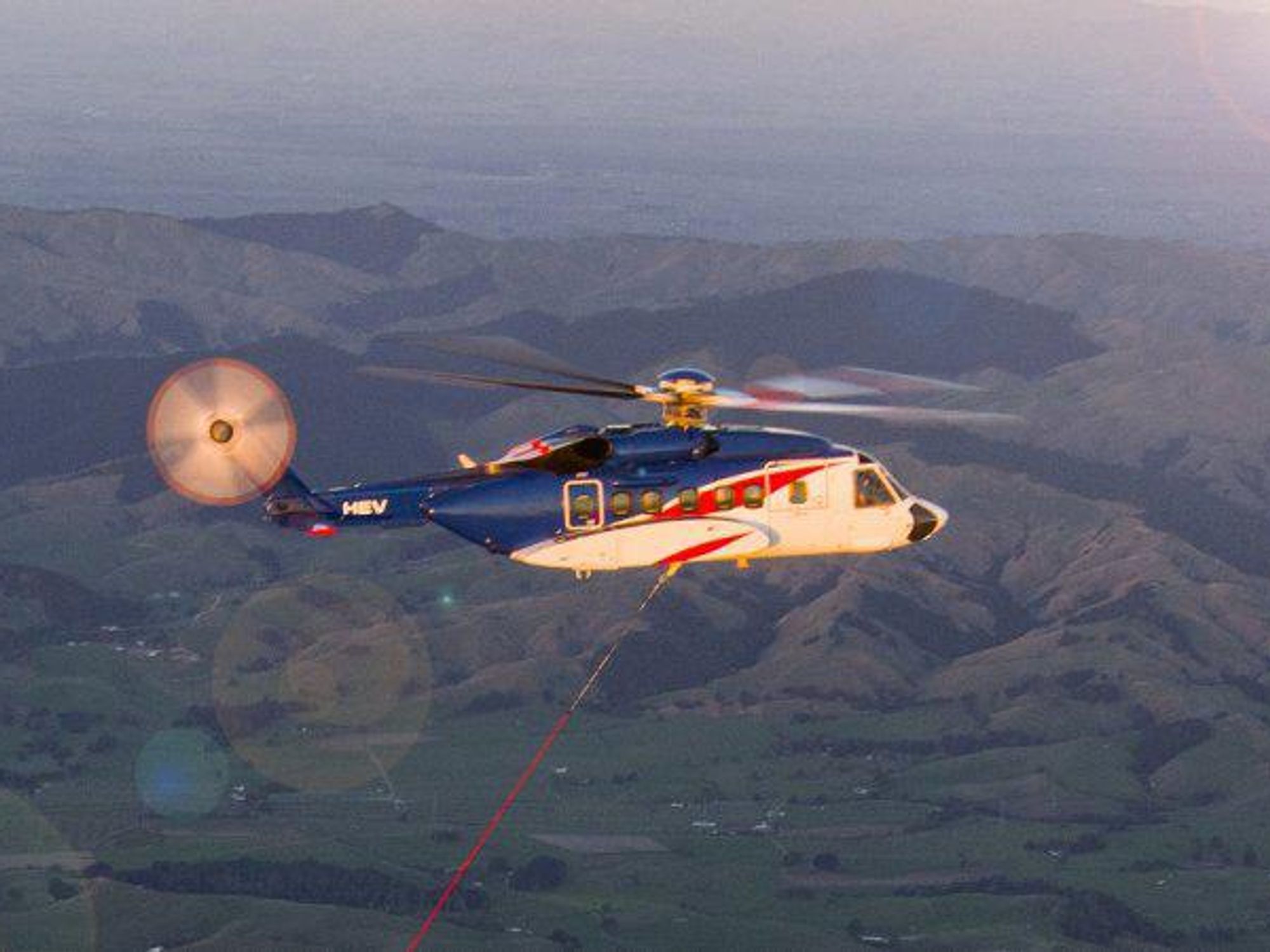 How Rocket Lab Is Using a Helicopter To Catch Rocket Parts Out of the Sky