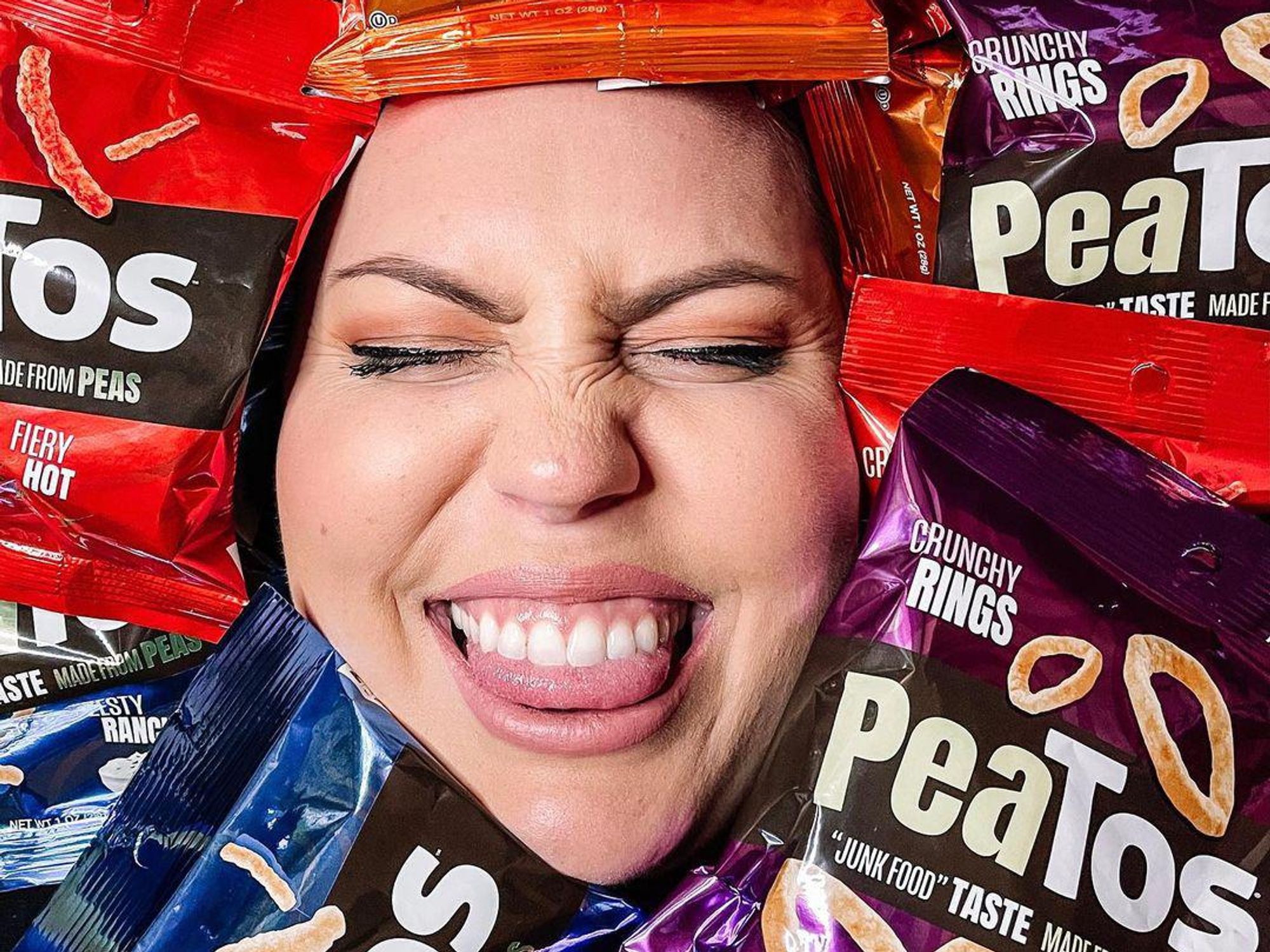 woman covered in peatos chips