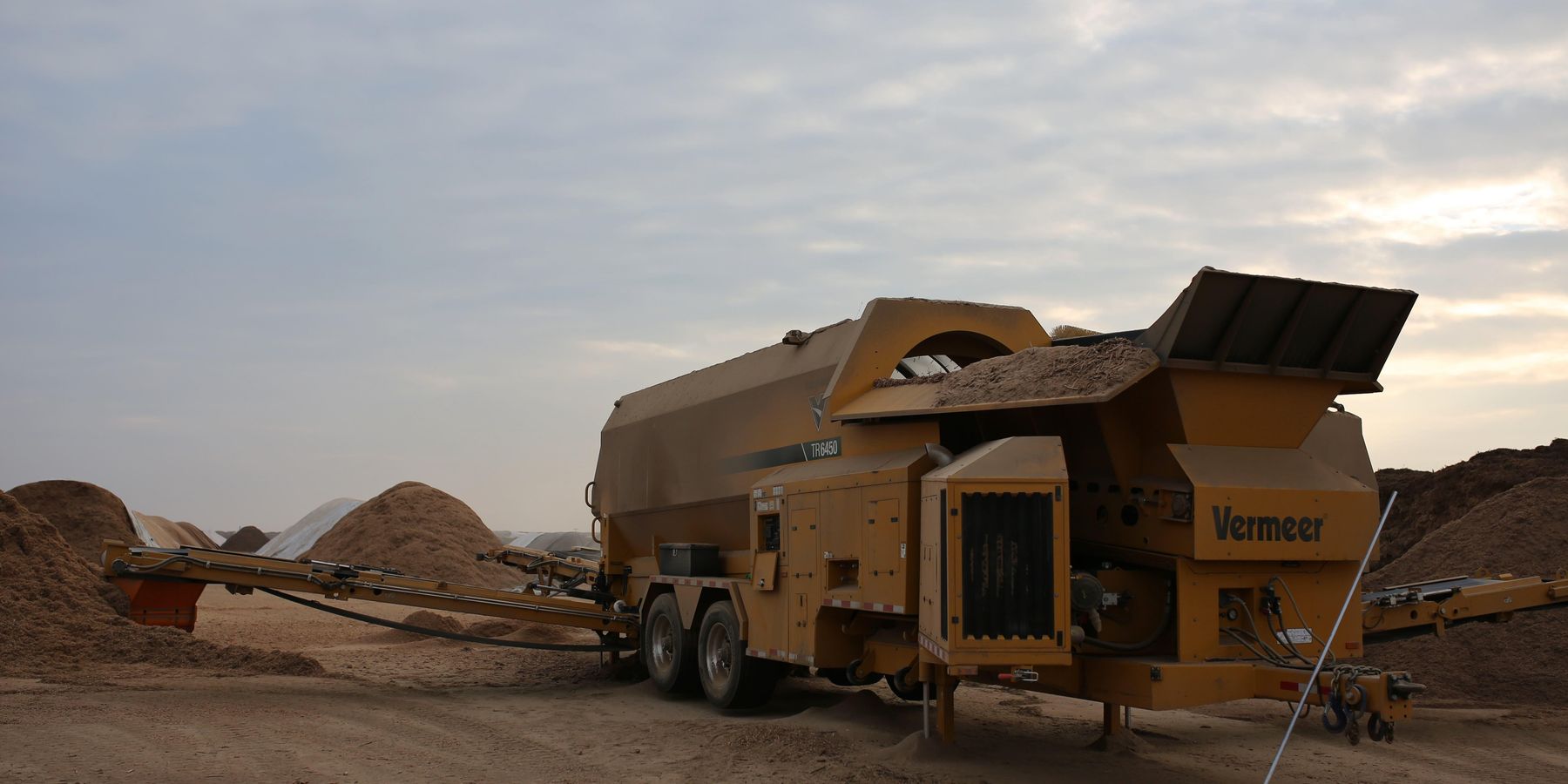 Wood chipping and storage for Mote Hydrogen.